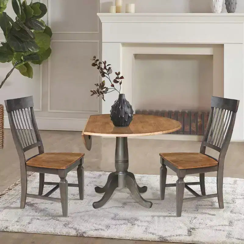 Set da 3 Pezzi Tavolo da Pranzo Rotondo da 42" con Doppia Prolunga a Goccia e 2 Sedie con Schienale a Sbarre Noce Americano/Carbone Lavato - International Concepts: Set Compatto in Parawood